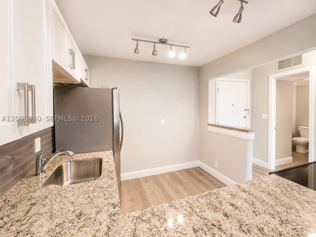 Photo of 1881 Middle River Dr #604, Fort Lauderdale, FL 33305 (MLS # A12095940)
