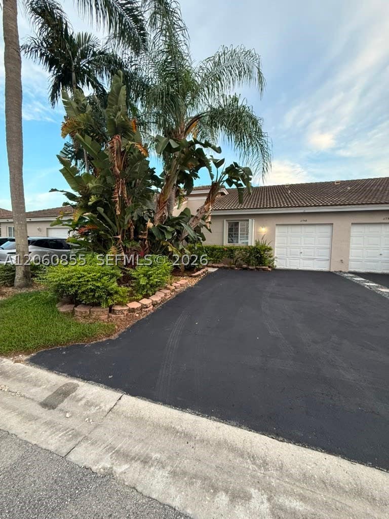 Photo of 11748 SW 17th Ct, Miramar, FL 33025 (MLS # A12060855)