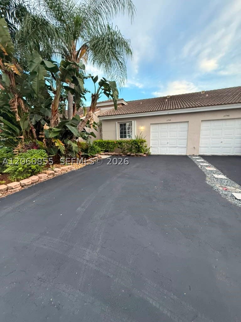 Photo of 11748 SW 17th Ct, Miramar, FL 33025 (MLS # A12060855)