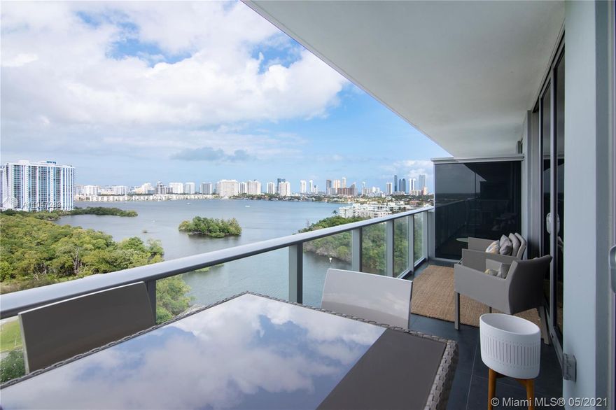 Professionally decorated 2/2 + DEN with direct Bay view.