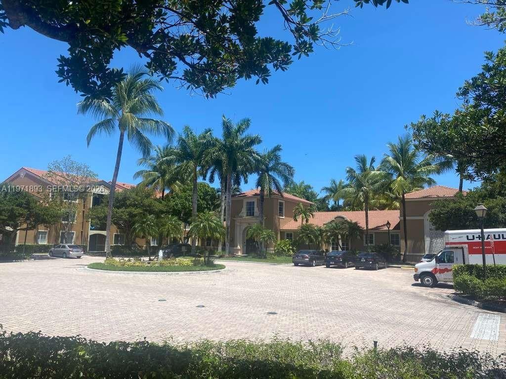 Photo of 7930 N Nob Hill Rd #304, Tamarac, FL 33321 (MLS # A11971893)