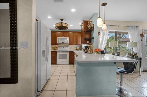 Tiny photo for 410 SW Natura Ave, Deerfield Beach, FL 33441 (MLS # A12005972)