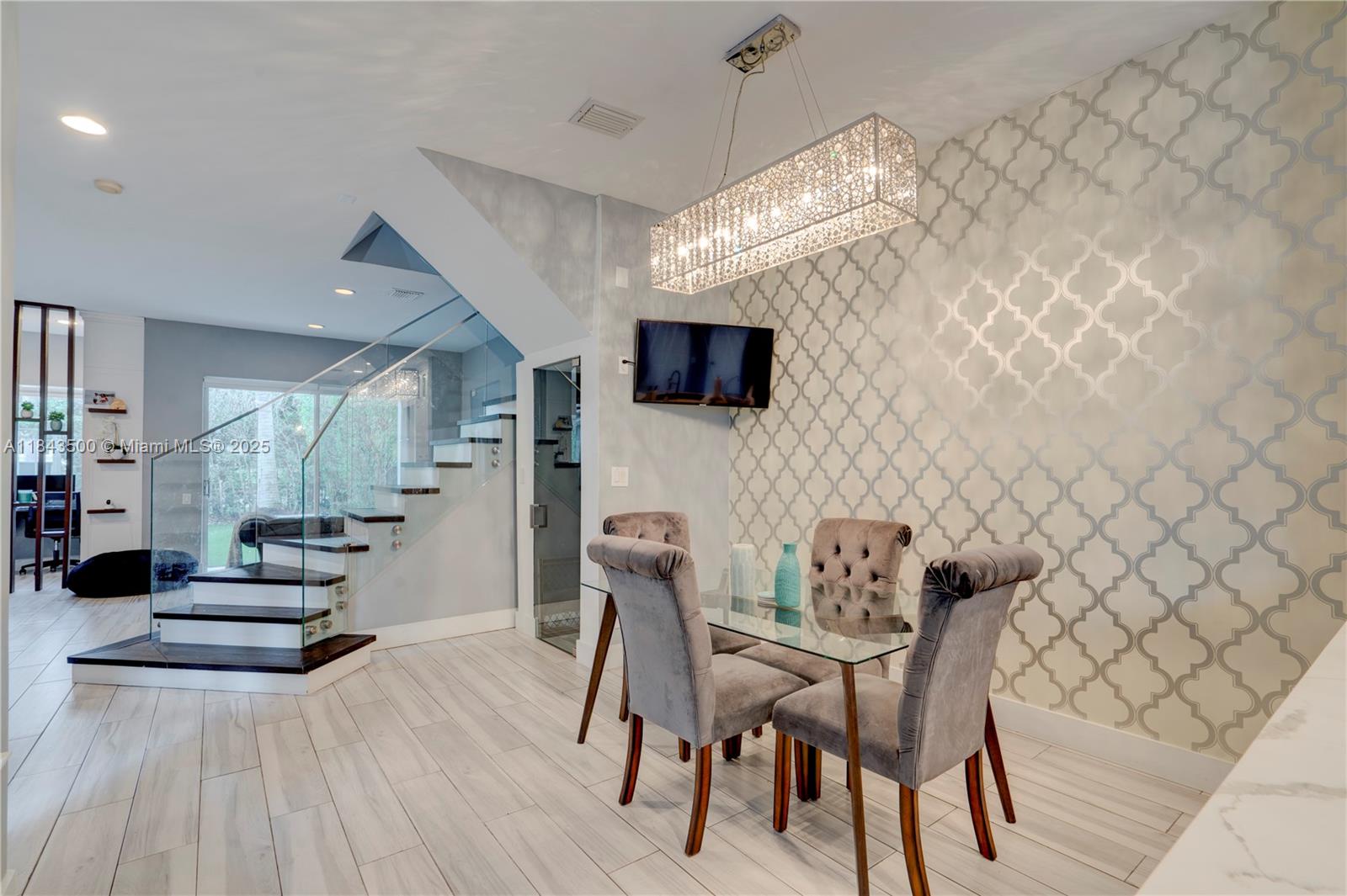 Experience luxury living in this partially furnished 3-bedroom, 2.5-bathroom townhouse in the prestigious Harbor Islands community. Spanning 2,100 square feet, this modern home features sleek finishes, a built-in bar, and an office nook, perfectly situated directly across from the Harborview community pool. Enjoy resort-style amenities, including the main pool, tennis and pickleball courts, basketball court, full-service gym with a yoga studio, weight room, and sauna, plus a clubhouse for special events. Rent includes 24-hour gated security, ADT security, premium cable, high-speed internet, and landscaping. Live in style and comfort in one of the area’s most sought-after neighborhoods.