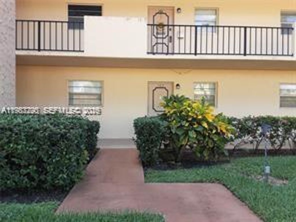 Photo of 100 Ashbury Rd #102, Hollywood, FL 33024 (MLS # A11983290)