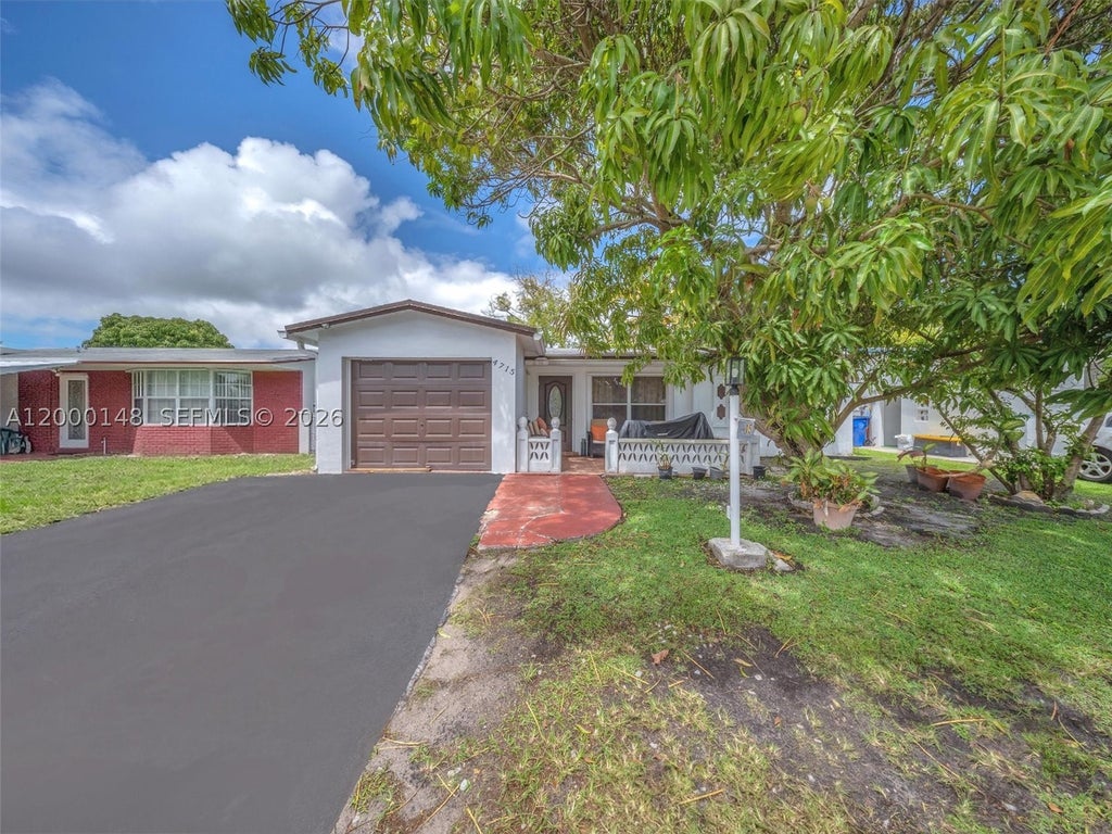 Photo of 4715 NW 43rd St, Lauderdale Lakes, FL 33319 (MLS # A12000148)