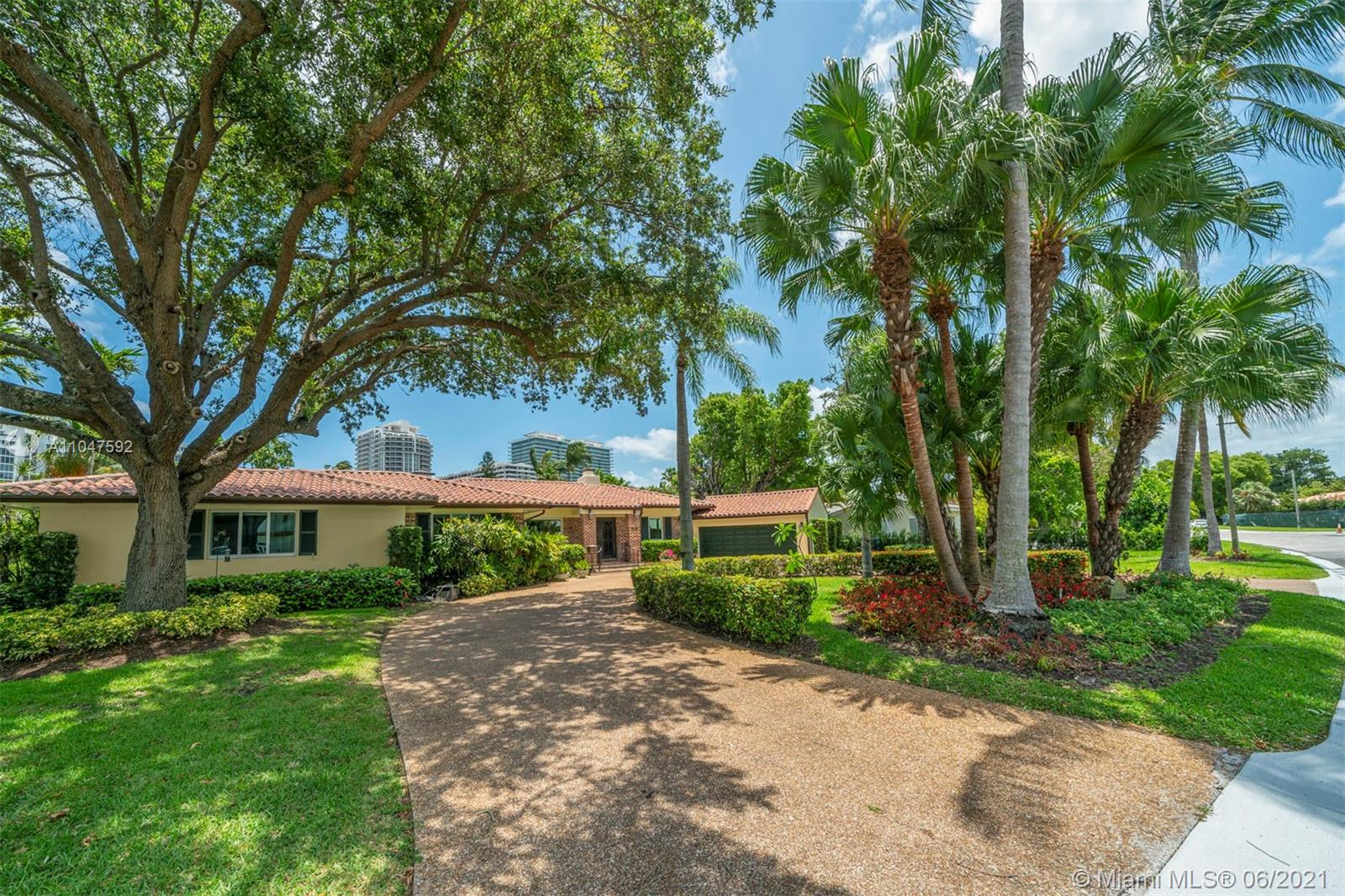 Stunning residence situated behind the gates of Bal Harbour Village on one of the largest lots.
This Elegant/chic home has great strong bones w/ sophisticated updates thru-out. New state-of-the-art open chefs kitchen w/ Viking Professional appl, adjacent family rm, formal dining, separate living room w/ fireplace which leads to library overlooking pool/covered patio. 5bd/4.5ba + ofc, 2 car gar, separate master suite w/ walk-in closet, dressing area & underlie river rock vanity, steam shower. New 23,000w generator w/ separate gas meter, new electrical, 3 new trane a/c systems w/ antibacterial UV, new pool pump equipment, travertine deck, new sprinkler system, hurricane impact windows/doors. Located steps to beach, Bal Harbour Shops, Surfside, restaurants, houses of worship, A+ school.