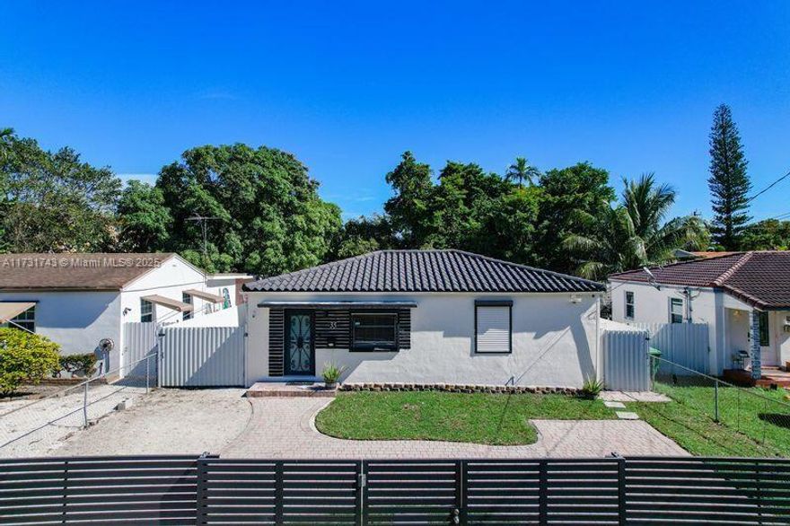 Charming 2-bedroom, 1.5-bathroom home located in the heart of Miami. This property features a spacious living area, updated kitchen with modern appliances, and a cozy backyard appropriate for outdoor gatherings. It also includes a 1-bedroom, 1-bathroom in law suite/studio with private entrance. Conveniently situated near shopping, dining, and major highways, this home offers both comfort and accessibility, Don't miss the opportunity to make this lovely house your new home!