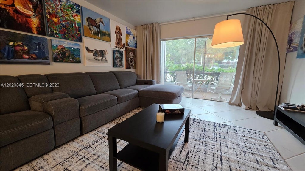 Photo of 3360 Spanish Moss Ter #104, Lauderhill, FL 33319 (MLS # A12020345)