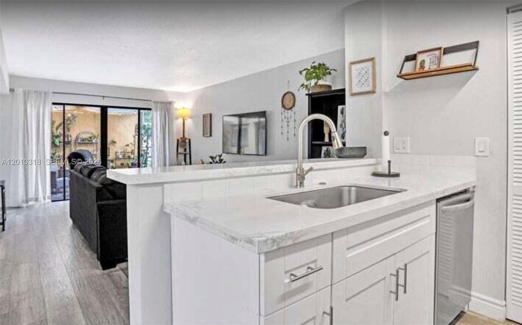 Photo of 8033 NW 71st Ct #8033, Tamarac, FL 33321 (MLS # A12010318)