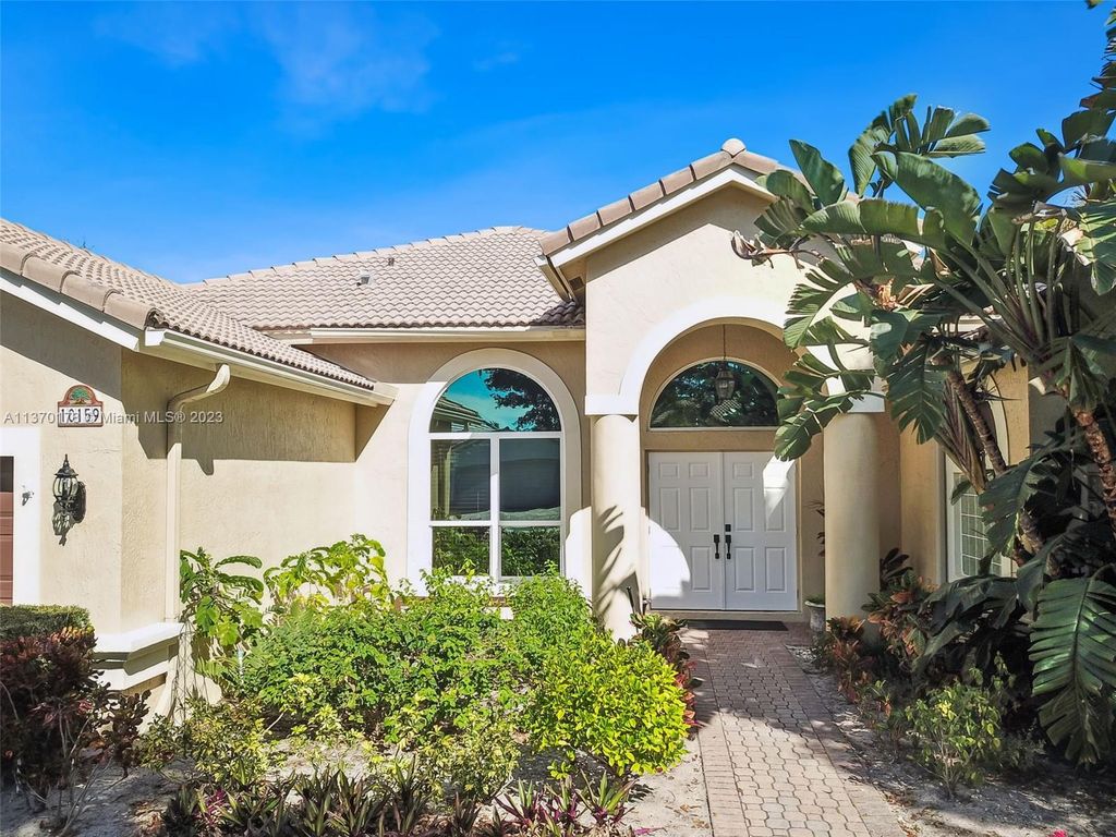 Photo of 10159 Umberland Pl, Boca Raton, FL 33428 (MLS # A11370178)