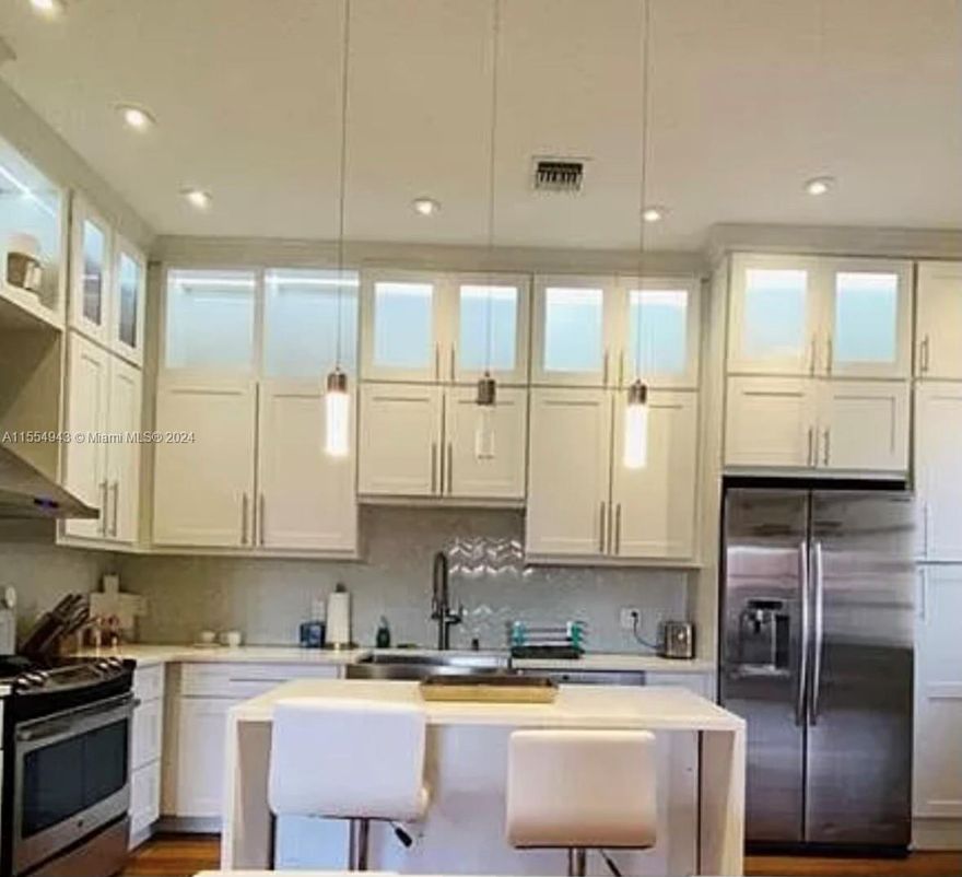 RUN DON'T WALK TO THIS COMPLETELY REMODELED 3 BED 2 BATH PLUS DEN OVER LOOKING THE POND LOCATED IN THE HIGHLY SOUGHT-AFTER CARRARA VILLAGE AT PLATINA COMMUNITY.