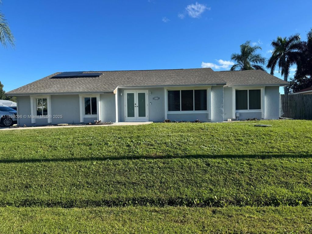 Photo of 2492 SE Rival Ave, Port St Lucie, FL 34952 (MLS # A11898096)
