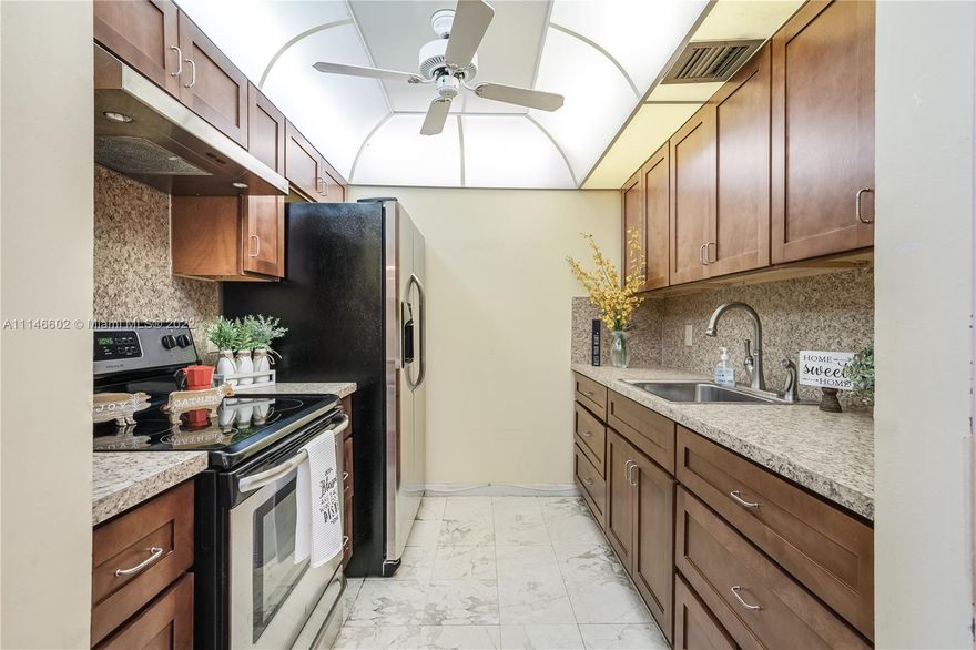 Look no further!!! This 1 bedroom 1 bath located on the 4th floor right off the elevator next to the laundry facilities has HURRICANE IMPACT WINDOWS AND DOORS, REMODELED KITCHEN with STAINLESS STEEL APPLIANCES and a beautiful water and golf view from the enclosed balcony, which not only is screened, but also has doors that can be closed when is raining. The shower bathroom has been tastefully remodeled and can also work for a handicap person (roll-in shower). Bathroom vanity is also an upgrade. Unit is close to the elevator and parking spot #407 is conveniently next to the stairs. Kingsley #407E pays the following maintenance fees: Landmark $189+CVP $231 Monthly. *CASH ONLY*