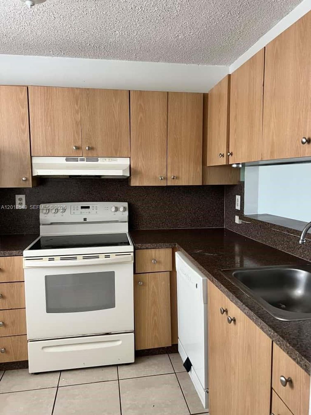 Photo of 3470 Foxcroft Rd #307, Miramar, FL 33025 (MLS # A12018549)