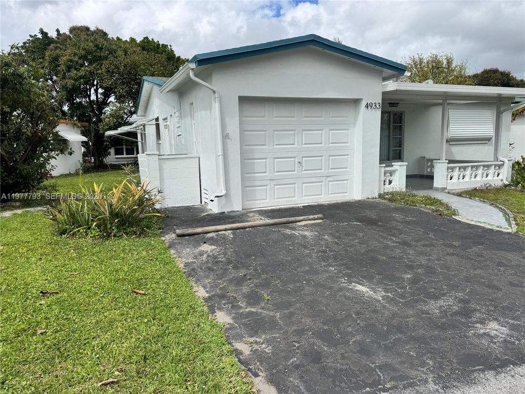 Photo of 4933 NW 42nd St, Lauderdale Lakes, FL 33319 (MLS # A11977793)