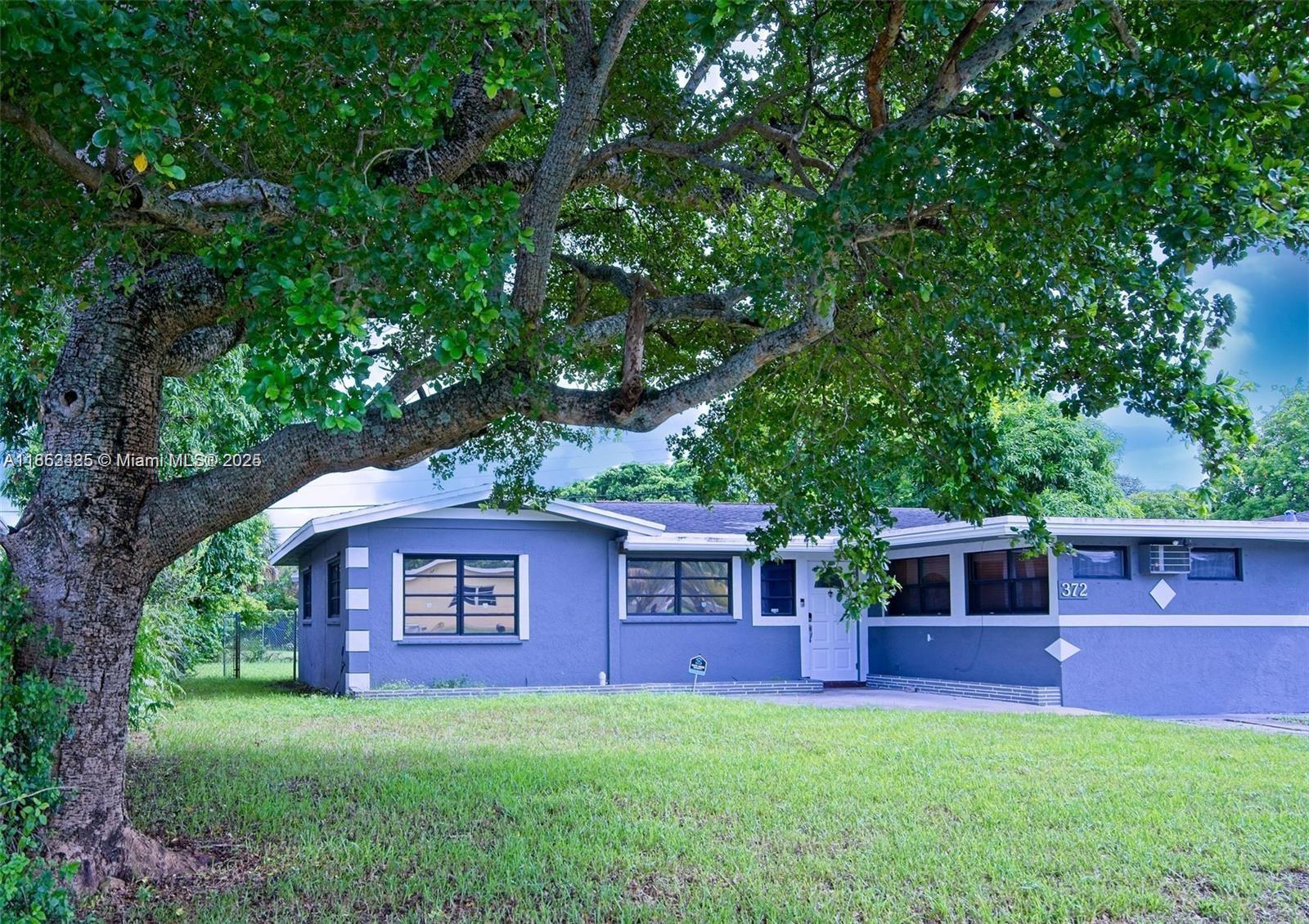 Recently appraised at $525,000, this stunningly renovated 4-bedroom, 2-bath home in growing Fort Lauderdale offers modern living with instant equity! Featuring a gorgeous chef’s kitchen with granite countertops, custom cabinetry, and stainless steel appliances, this home is designed to impress. Spacious living and dining areas flow seamlessly with updated tile and wood flooring. Hurricane shutters provide peace of mind, while the expansive fenced backyard with storage shed offers endless possibilities—add a pool, create an outdoor kitchen, or build your dream garden. Ideally located minutes from shopping, dining, golf, major highways, and just 15 minutes from Fort Lauderdale’s world-famous beaches. A move-in-ready gem in a booming neighborhood—don’t miss your chance to own it!