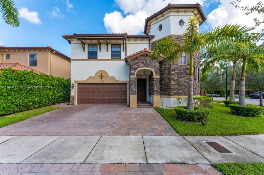 Exquisite spacious corner home at the gated community of Grand Bay Estates. Elegant 2-story residence with 4,159 SF, offering comfort, high ceilings, plenty of natural light, 5-beds, 5-remodeled baths, walk-in closets. Master bath with double shower & tub; White porcelain flooring on first level & laminate wood on the second. Living room, florida room, formal dining and a thoughtfully designed kitchen, equipped with stainless steel appliances, ample cabinetry and big island. Charming outdoor patio with artificial grass, perfect for gatherings and barbecues, 2-car garage with an electric car charger, and 3 cars in driveway + extra guest parking infront. Resort-style clubhouse with pools, cabanas, sports amenitiies, events rooms. Pet-friendly community. Option for furnished also available.