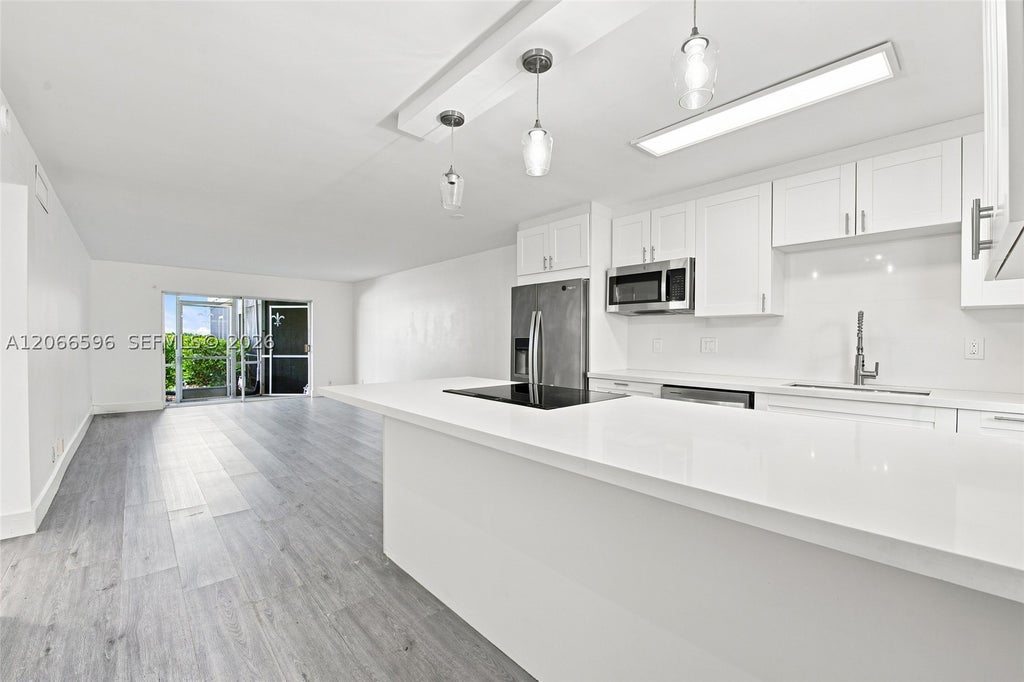 Photo of 222 N Federal Hwy #115, Deerfield Beach, FL 33441 (MLS # A12066596)