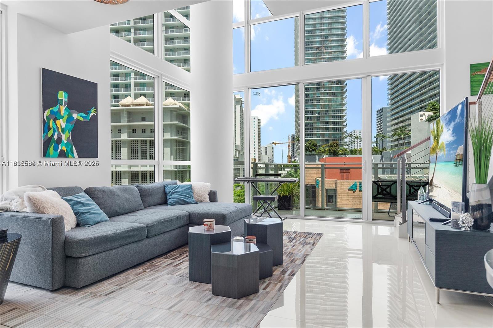 Rarely available fully furnished 1 bd 1.5 bth townhouse / loft in the heart of Brickell, steps to dining, shopping, and entertainment. 1078 SQFT with luxurious finishes located at The Bond on Brickell. Floor-to-ceiling windows offer maximum natural light and views, complete with large balcony. Extraordinary opportunity for those seeking a sophisticated and comfortable urban lifestyle, located in one of the trendiest neighborhoods in the US. Assigned parking space located right next to the condo. Top-of-the-line appliances, fixtures, and oversized walk-in closet. The couch shown in the photos is being replaced. Tenant occupied until 8/24/25.