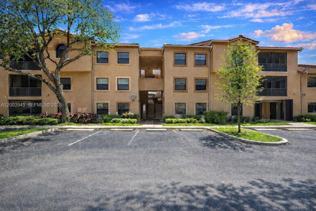 Photo of 10790 NW 14th St #184, Plantation, FL 33322 (MLS # A12003945)