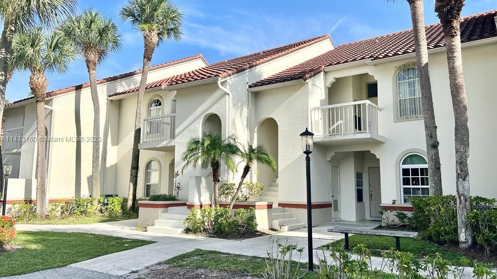 Photo of 227 Cypress Point Dr #227, Palm Beach Gardens, FL 33418 (MLS # A11432160)