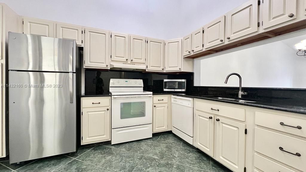 Photo of 227 Cypress Point Dr #227, Palm Beach Gardens, FL 33418 (MLS # A11432160)