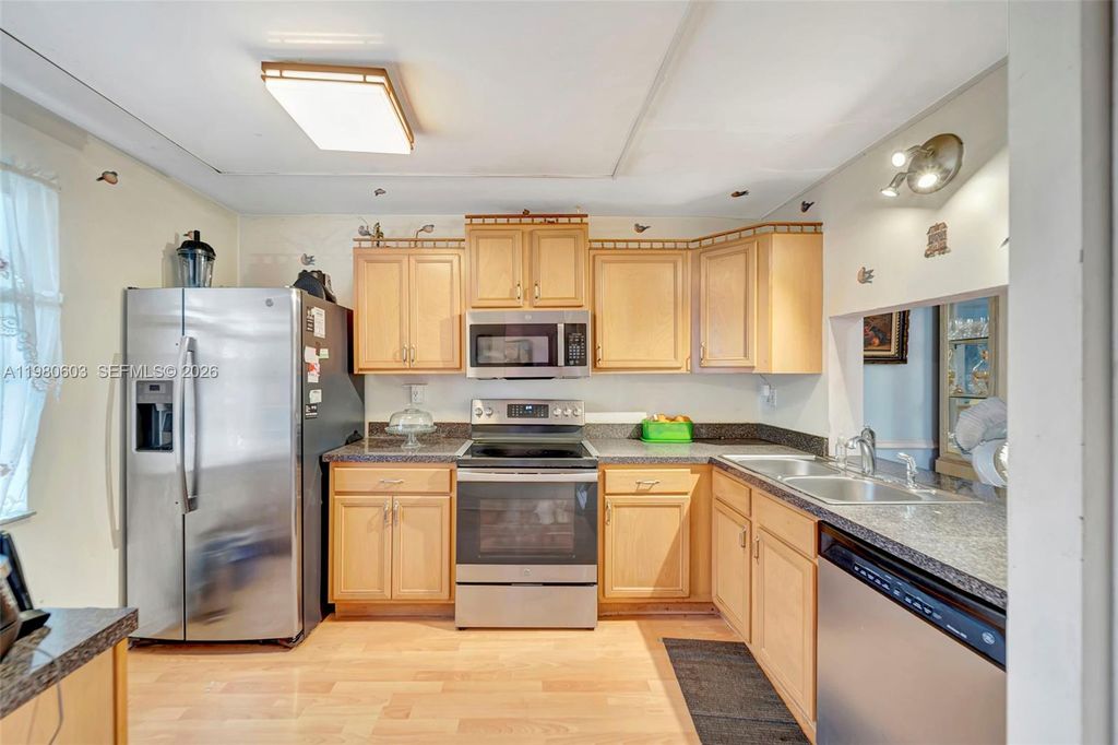 Photo of 3940 Inverrary Blvd #303-A, Lauderhill, FL 33319 (MLS # A11980603)