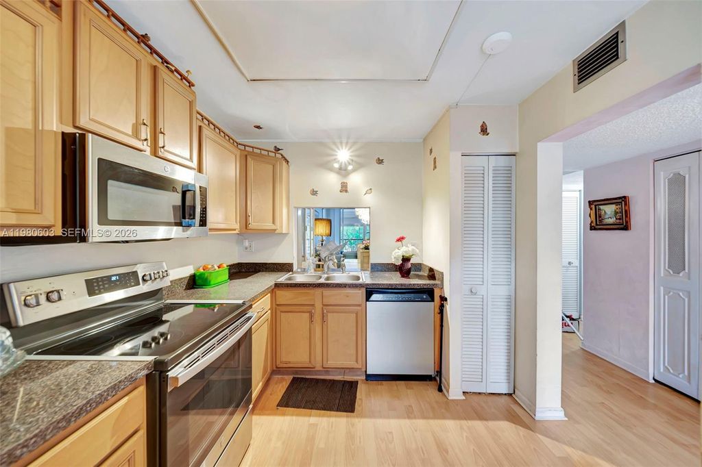 Photo of 3940 Inverrary Blvd #303-A, Lauderhill, FL 33319 (MLS # A11980603)