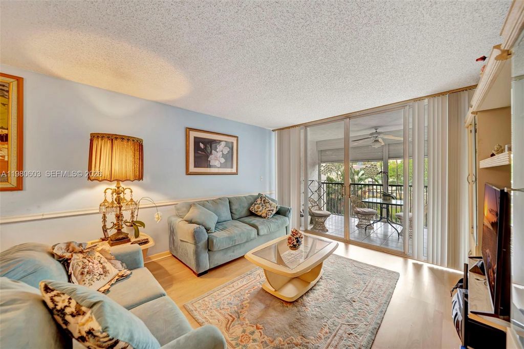 Photo of 3940 Inverrary Blvd #303-A, Lauderhill, FL 33319 (MLS # A11980603)