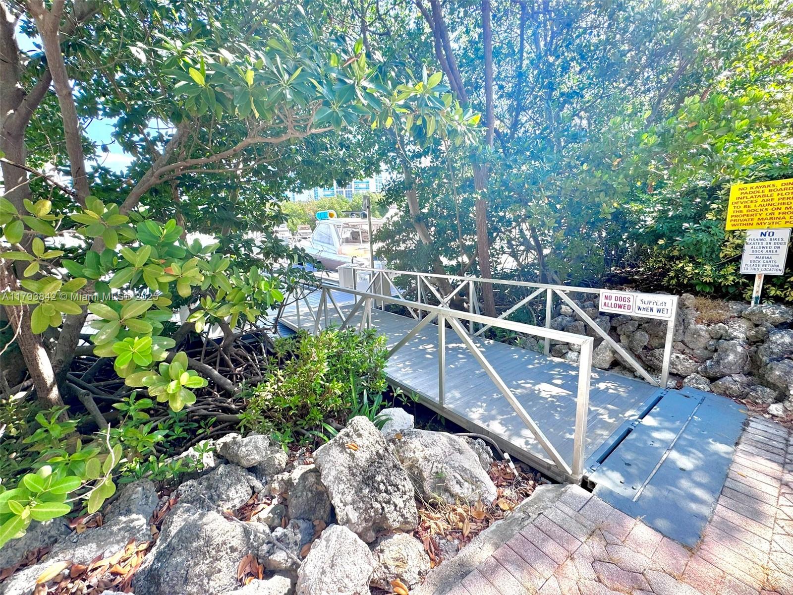 Rarely listed! Own a rare 60-foot x 17.5-foot deeded boat slip on a floating dock in the fully renovated and prestigious Mystic Pointe Marina, located in the heart of Aventura! Enjoy the convenience of a floating dock—no tide concerns—within a gated community offering 24-hour security. Dockmaster on premise. Residency is not required to own. Features include 30-50 Amp service, water, electric, and cable. Deep water access with no fixed bridges—just 20 minutes to the ocean via Haulover Inlet, 55 minutes north to Fort Lauderdale, and only 40 miles from the Bahamas. HOA: $481.33/month + $494.00/quarter. No liveaboards. THE SLIP IS AVAILABLE ON JULY 15, 2025.