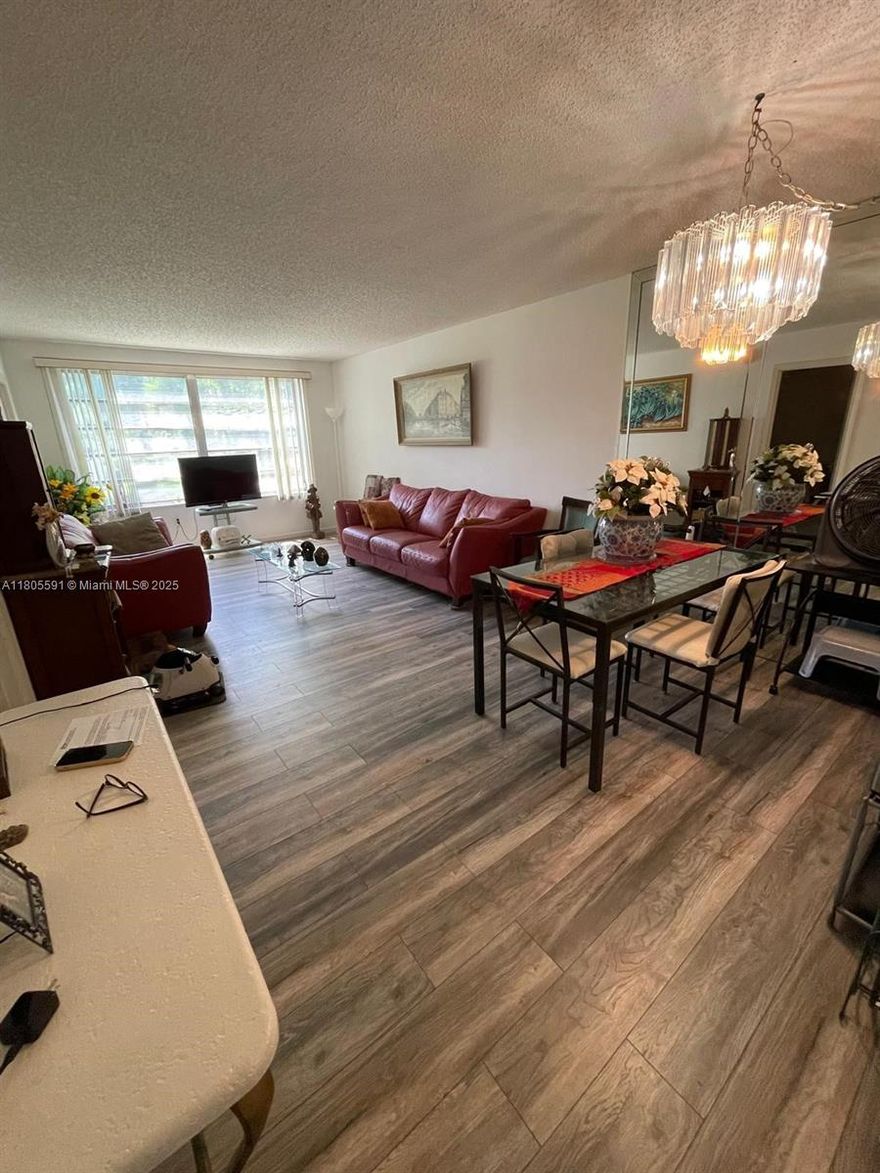 Spacious 2 bed/2 bath in a quiet residential area. The layout of this property is good because the 2nd bedroom and bath are separated from the master and is ideal for a roommate or in-law situation. Kitchen has a breakfast area. Lots of natural light, several good size closets. Laundry room is separate, by the porch area. Amenities include a pool, gym, tennis courts. There is a lot of green space in this complex. One assigned parking and several guests parking. It's right in front of the Plantation High School.