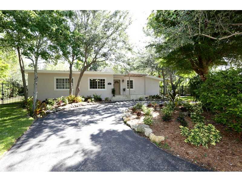 Enjoy fishing, canoeing, and relaxing on this rarely available home on pristine and private Coral Lake. Located on a lovely, secluded street minutes from Coral Gables, South Miami, and in top-rated David Fairchild and South Miami school district. Sunlit h ome offers a great open layout. Impact windows, brand new kitchen, big walk-in master closet, and in a no-flood zone. Fenced and private 17,000+ sq. ft. lot is wide and deep and has plenty of room for a pool.