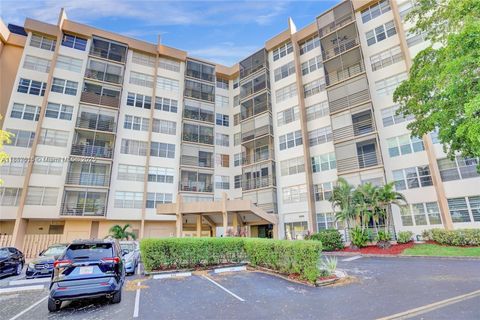Photo of 1100 Saint Charles Pl #504, Pembroke Pines, FL 33026 (MLS # A11853516)