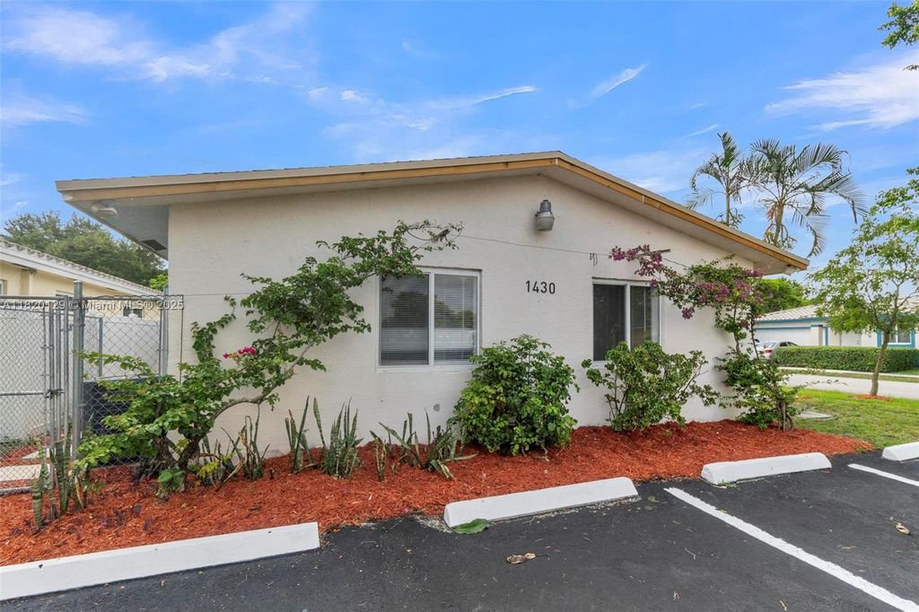 Photo of 1430 NW 27th Ave #1-2, Fort Lauderdale, FL 33311 (MLS # A11820129)