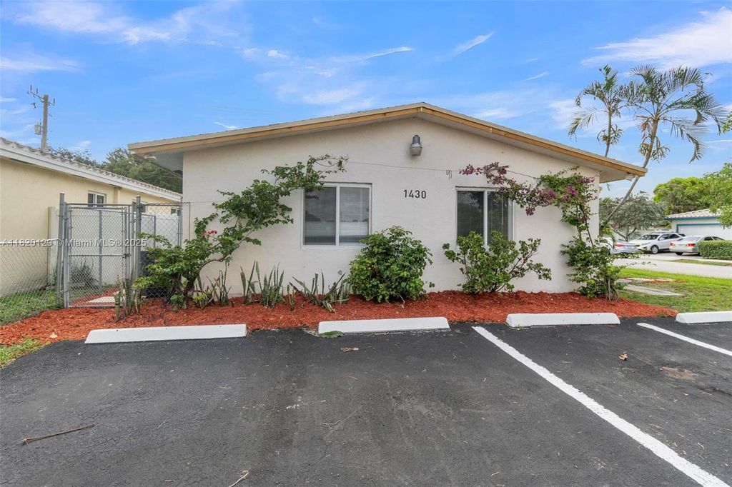 Photo of 1430 NW 27th Ave #1-2, Fort Lauderdale, FL 33311 (MLS # A11820129)