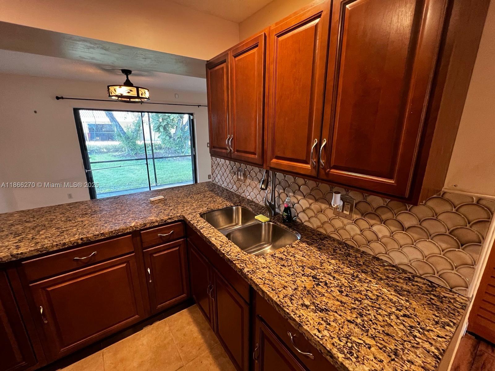 Beautiful Piece of Paradise! Rent this Perfectly Located Townhouse in Coral Springs. Close to 5-Star Dining, Shopping, and Major Highways. This home Offers Ideal Convenience. Inside, Spacious Bedrooms, Generous Closet, Full-Sized Washer and Dryer, and Abundant Storage —Including a Dedicated Outdoor Storage Closet. Water included. Private Screened-In Patio. Accordion Hurricane Shutters Offer Added Peace of Mind, and the Sparkling Community Pool is very close. This Home Has It All.