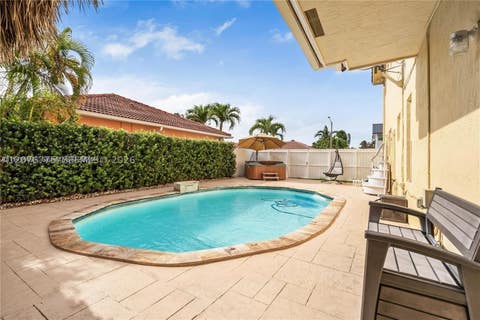 Tiny photo for 13904 SW 18th Ter, Miami, FL 33175 (MLS # A12076775)