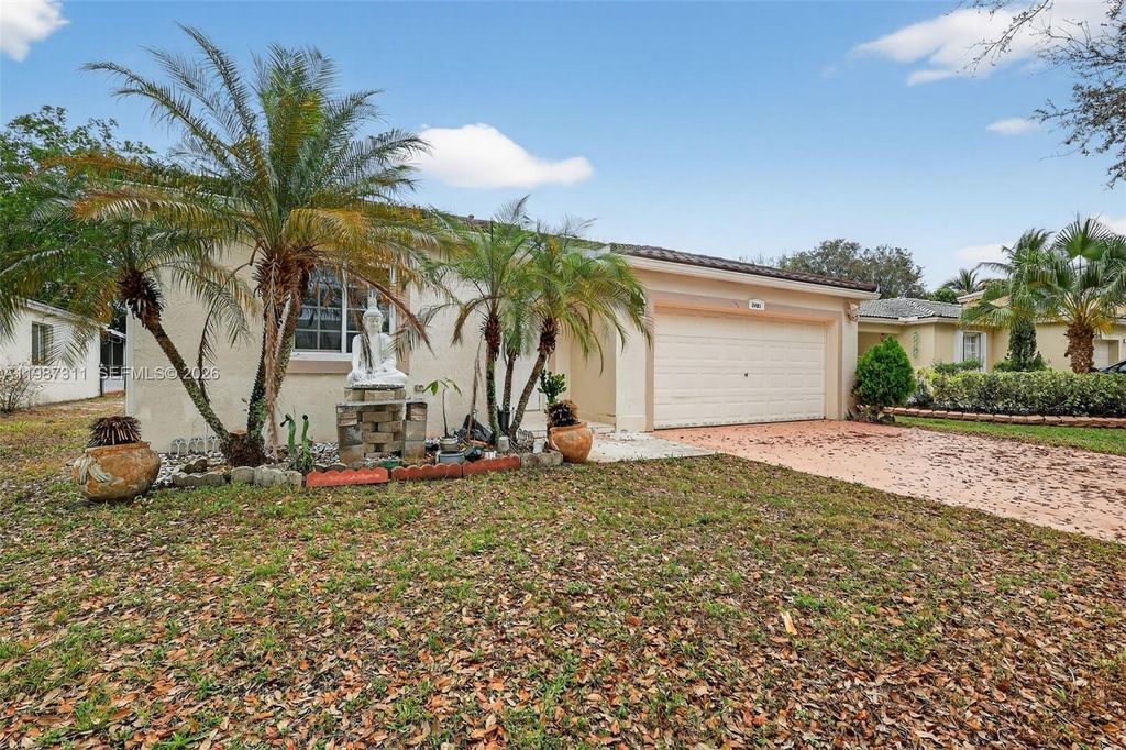 Photo of 2481 SW 102nd Ave, Miramar, FL 33025 (MLS # A11987311)