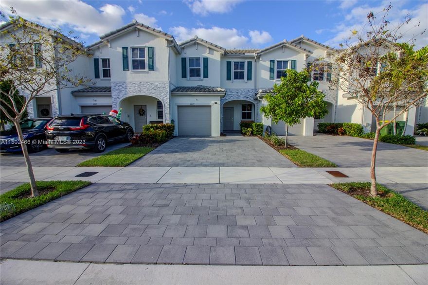 **PRICE REDUCED**Resort-style living. This beautiful upgraded townhome is exactly what your client is looking for; paved and fenced patio, chandelier lamp, tile flooring throughout the home, porcelain tile flooring in garage, plantation shutters in all windows and glass door patio entry, accordion storm shutters, kitchen sink & faucet upgrade, a beautiful tile backsplash & so much more. This property is completely gated with access to a Clubhouse with staff on site for all your community needs. Low HOA fees, close to Turnpike, Fl Keys, Shopping, Entertainment & more. Please refer to my photo gallery for pre-view. For showings please book on showingtime or call listing agent.