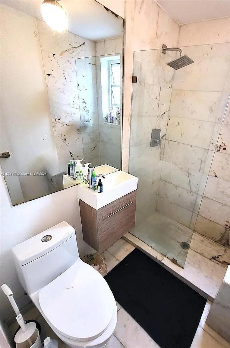 FIRST ON 8TH CONDO - Residential