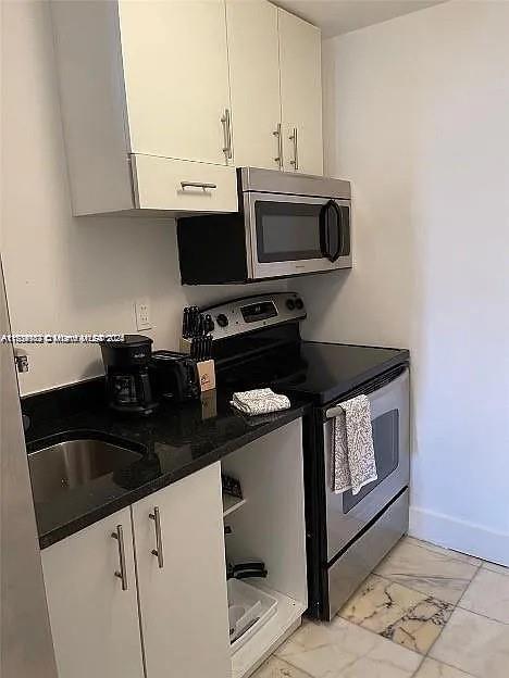 FIRST ON 8TH CONDO - Residential