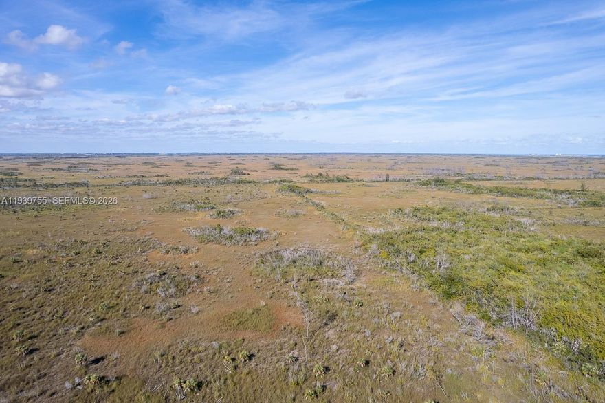 Great investment property. Currently this lot is located in a restricted area with limited access. Beside the aerial photograph, listing agent has several videos of the land. This area was originally targeted for the employees of Turkey Point Power Plant. This pocket of land is seeing development from both the West (Old Card Sound Road) and North(SW 344 Street)