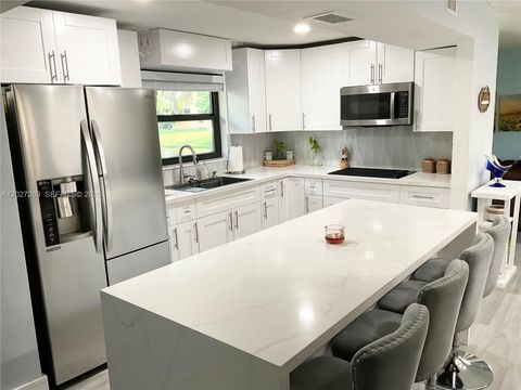 Tiny photo for 1502 NW 90th Way #1502, Pembroke Pines, FL 33024 (MLS # A12027269)