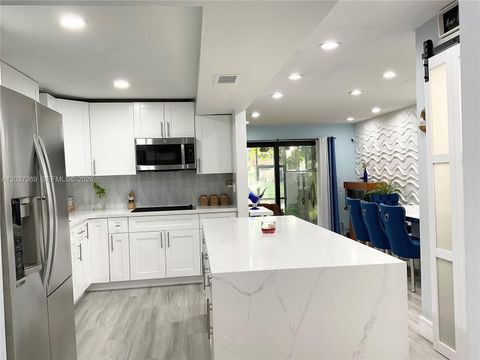 Tiny photo for 1502 NW 90th Way #1502, Pembroke Pines, FL 33024 (MLS # A12027269)