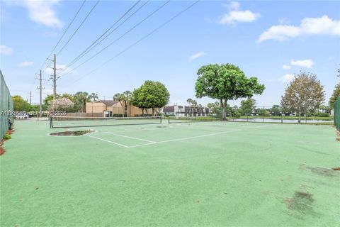 Tiny photo for 1502 NW 90th Way #1502, Pembroke Pines, FL 33024 (MLS # A12027269)