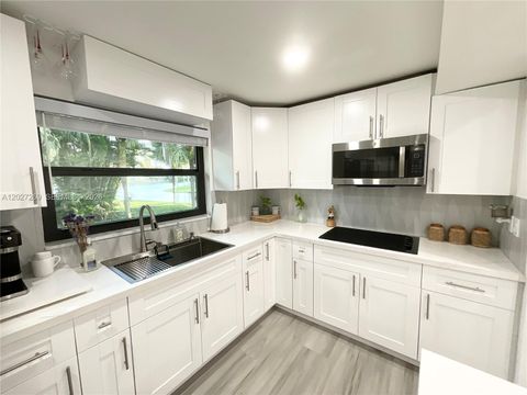 Tiny photo for 1502 NW 90th Way #1502, Pembroke Pines, FL 33024 (MLS # A12027269)
