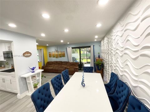 Tiny photo for 1502 NW 90th Way #1502, Pembroke Pines, FL 33024 (MLS # A12027269)