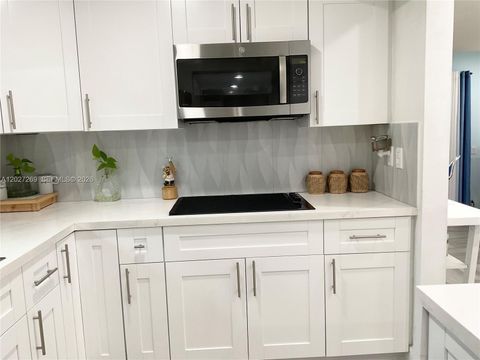 Tiny photo for 1502 NW 90th Way #1502, Pembroke Pines, FL 33024 (MLS # A12027269)