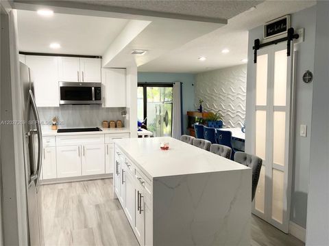 Tiny photo for 1502 NW 90th Way #1502, Pembroke Pines, FL 33024 (MLS # A12027269)