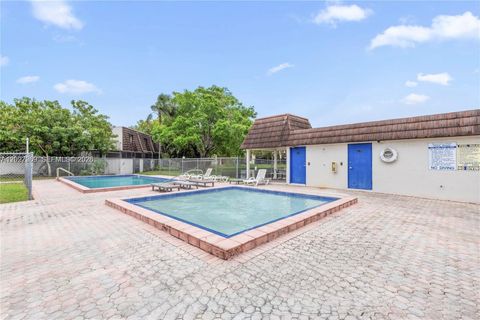 Tiny photo for 1502 NW 90th Way #1502, Pembroke Pines, FL 33024 (MLS # A12027269)